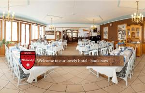 A restaurant or other place to eat at Hotel Walliserhof - The Dom Collection
