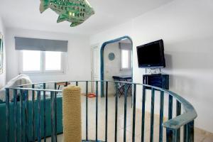 a living room with a staircase and a mirror at Las Sales Duplex in Moya