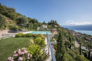 a view of the house from the balcony at Villa Agave exclusive pool in Toscolano Maderno
