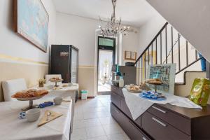 a kitchen with two counters with food on them at B and B 7 Camini in Verona