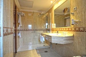 Koupelna v ubytování Hotel Alisi