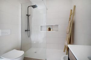 a bathroom with a shower and a toilet at Villa Atlantic View in Salir de Porto +29 photos