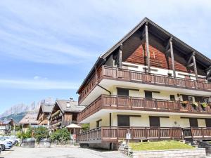 a building with balconies on the side of it at Apartment Marmolada-13 by Interhome in Alba di Canazei