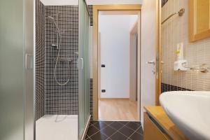 a bathroom with a shower and a sink at Casa-lago suite 55 in Brenzone sul Garda +29 photos