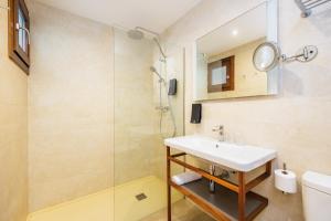 a bathroom with a sink and a shower at Hostal Boutique Canyamel in Canyamel +83 photos