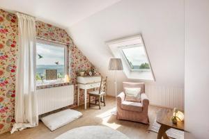 a room with a desk and a chair and a window at Ferienwohnung Am Jakobsweg in Schmallenberg