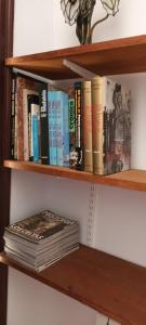 a bunch of books sitting on a shelf at Marina in Lleida