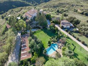 an aerial view of an estate with a swimming pool at Casa Farigola in El Bruc