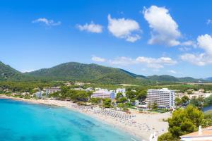 a view of a beach with people on it at Apartament Massanet 2b in Canyamel