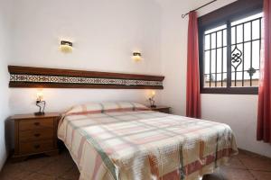 a bedroom with a bed and a window at Villa Perez Zara 2 in Campano +20 photos