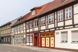 a row of buildings on a street at Ferienhaus Salzwedel in Salzwedel