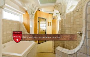 Kúpeľňa v ubytovaní Hotel Walliserhof - The Dom Collection