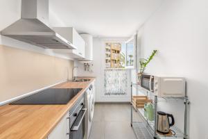 a kitchen with a sink and a counter top at Lopimar Playa in Canet de Berenguer