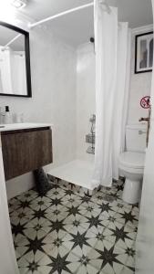 a bathroom with a toilet and a sink and a shower at Studio Despoina in Skala Kallonis +63 photos