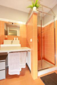 a bathroom with a sink and a shower at Gipsy Rose in Sarzana +39 photos