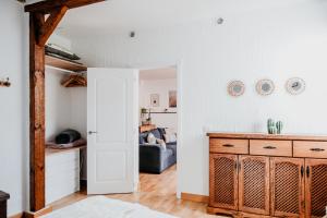 a living room with white walls and a couch at Casa Rural Kiko 2 in Icod de los Vinos