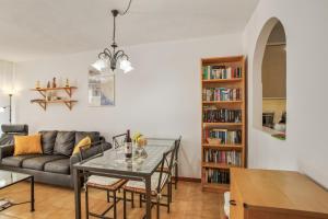 a living room with a couch and a table at Casa Carmelo in Patalavaca