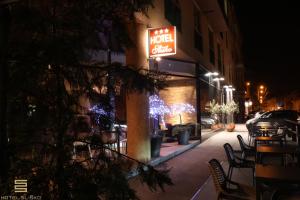 a motel sign on the side of a building at night at Hotel Sliško in Zagreb