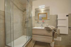 a bathroom with a shower and a sink at Il Pellegrino in Issogne