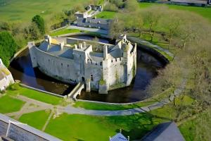 an aerial view of a castle in a river at Chez Manie Et Mablot in Créances