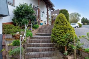 a set of stairs in front of a house at Haus Domblick in Gückingen