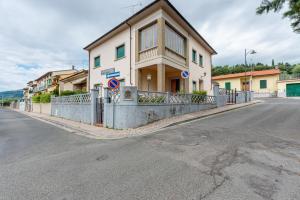 a building on the side of a street at Giada Apartment in Calenzano