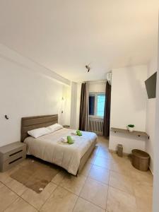 a bedroom with a bed and a window in it at Villa Martila in Bari +54 photos