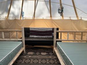 Llit o llits en una habitació de 22ft authentic Tipi