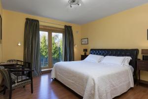 Postel nebo postele na pokoji v ubytování Kilbree House B&B