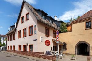 a building on the side of a street at Ferienwohnungen Eulenspiegel in Breisach am Rhein +84 photos
