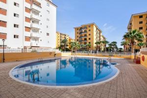 a large swimming pool in the middle of a building at El Pisito de Momo in Candelaria