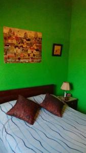 Ένα ή περισσότερα κρεβάτια σε δωμάτιο στο Cabañas Los Algarrobos