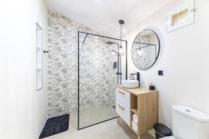 a bathroom with a shower and a sink at El Castañar de Ceubia in Arenas de San Pedro