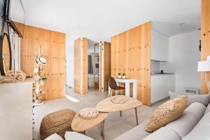 a living room with a couch and a table at Marce in Ciutadella +12 photos