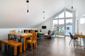 a dining room with a table and chairs at Sonne und Mehr in Stockach