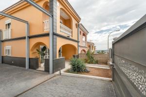 an exterior view of a house at Villa en Las Caletillas in Punta Larga