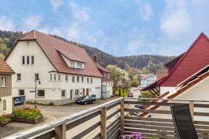 a view from a balcony of a village with houses at Apfelkiste in Meßstetten