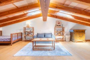 a living room with a couch and a table at Finca can Mandai in Son Carrió +15 photos