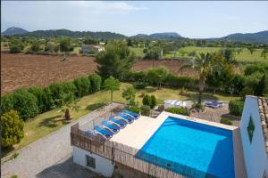 an aerial view of a villa with a swimming pool at Can Pou Petit in Pollença