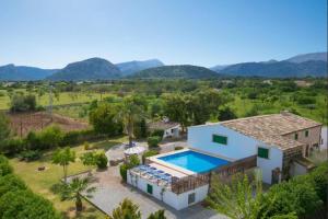 an aerial view of a villa with a swimming pool at Can Pou Petit in Pollença