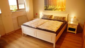 a large bed in a room with at Casa Mia 2 in Bad Dürkheim