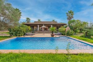 an image of a swimming pool in front of a house at Son Barbudet in Campos