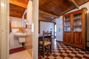a bathroom with a sink and a toilet in a room at Il Conte e La Contessa in Sennori +36 photos