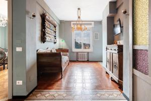 a room with a bedroom with a bed and a table at 5 Terre - Lerici - Aless View in Lerici