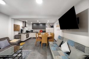 a living room with a couch and a table at Ferienwohnung Dina in Haslach im Kinzigtal