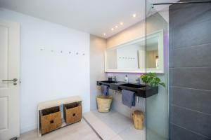a bathroom with a sink and a mirror at Lagomar in Alcudia +19 photos