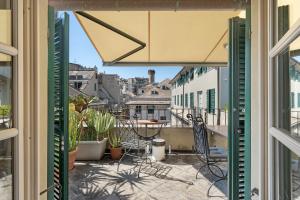 a view from the balcony of a apartment with a patio at Attico Palazzo Giustiniani in Genoa