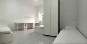 Postelja oz. postelje v sobi nastanitve Apartments Šik 2