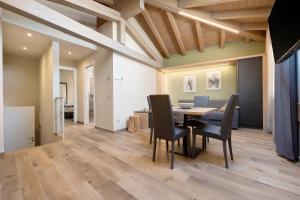 a dining room with a table and chairs at Casa Donati Lucia in Tremosine Sul Garda