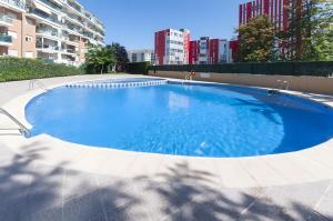 a large swimming pool in the middle of a building at Calma Mar in Los Mártires